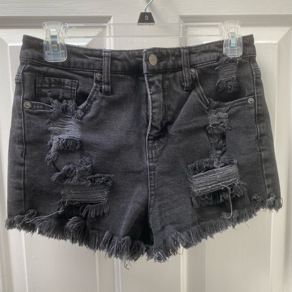 Distressed black cutoff denim
